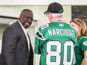 Former Saskatchewan Roughriders receiver Don Narcisse chats with fans on May 5, 2018, at Capital GMC.