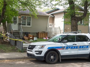 A police cruiser sits out in front of a home on the 1100 block of Retallack Street. BRANDON HARDER/ Regina Leader-Post
