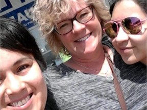 L-R: Crystal Stone, Wanda Friesen and Odera Wapass pose together after taking a stand against what they saw as discriminatory behaviour.