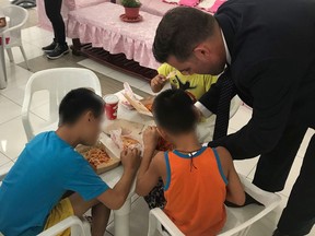 On May 31, 2018, Sgt. Jay Schooley, RCMP Liaison Officer responsible for the Philippines, and Cpl. Jared Clarke from the Saskatchewan Internet Child Exploitation Unit, teamed up with the Philippines National Police, Police Regional Office 8 (PRO8) in Leyte to put smiles on the faces of 26 children and their support workers. There was an idea to provide Filipino favorite cuisine, Jollibee, to the staff and residents at the Department of Social Work and Development Reception and Study Center for Children. With support from senior officers at PRO8 and RCMP/ICE members, the group was able to enjoy Yum Burgers and Jollibee Spaghetti for the children. Supplied Photo