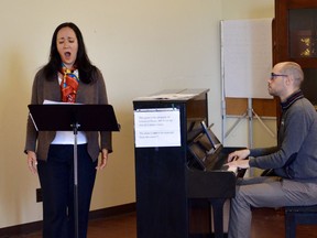 Canadian mezzo-soprano Marion Newman, left, sings during a workshop for a new opera being written about the life of Shawnadithit, the last surviving member of the Beothuk people in Newfoundland in St. John's, N.L. in this undated handout photo.