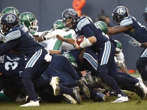 Toronto Argonauts quarterback Cody Fajardo runs for the winning touchdown during the CFL's East Division final against the visiting Saskatchewan Roughriders.