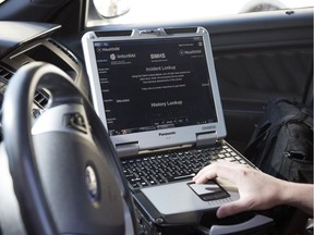 Cst. Eric Lauf with the Regina Police Service demonstrates the HealthIM app installed on their in-car Computer Aided Dispatch (CAD)  in Regina. The pilot project software is in every police cruiser and at detention to help officers do mental health risk assessments.