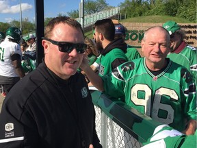 Saskatchewan Roughriders head coach and general manager Chris Jones spent time with fans after the team's Green and White Day on Saturday in Saskatoon.