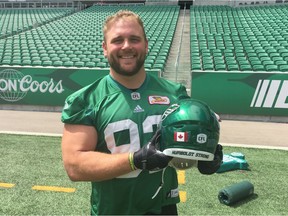 Saskatchewan Roughriders defensive tackle Zack Evans is proud to wear Humboldt Strong on his helmet and to don a wristband that pays tribute to SJHL team.