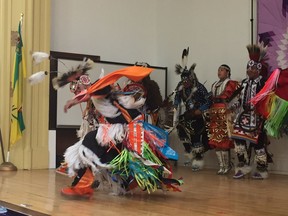 Dancers perform a victory dance in celebration of the new Indigenous student strategy at Saskatchewan Polytechnic in Saskatoon, Sask. on June 19, 2018.