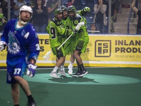Saskatchewan players celebrate a goal against the Knighthawks during Saturday's NLL-finals opener.
