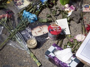 People gathered in the parking lot of the South Leisure Centre on Monday, June 25, 2018, to honour their friend, 15-year-old Athan McEwen, who was killed in an accident there on Friday night, June 22, 2018.