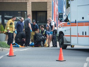 Emergency responders removed an injured person from the scene of an incident at the intersection of Victoria Avenue and Osler Street.