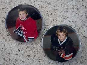 A couple of buttons showing Washington Capitals' forward Chandler Stephenson as a youth in Saskatoon Minor Hockey.