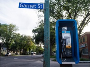 A payphone at the intersection of Garnet Street and Dewdney Avenue.