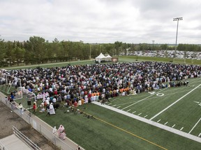 Thousands of Muslims bowed in prayer on the University of Regina Football Field as the Muslim community in Regina celebrates the end of the month of Ramadan with communal prayers.