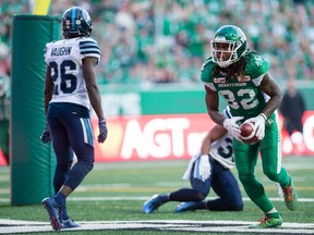 Naaman Roosevelt, 82, celebrates the Saskatchewan Roughriders' only offensive touchdown in Friday's season-opening, 27-19 victory over the Toronto Argonauts.