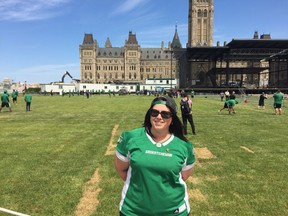 Roughriders fan Jaclyn O'Shaughnessy watched her favourite team practice on Parliament Hill in Ottawa.
