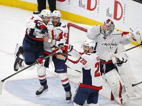 Members of the Washington Capitals celebrate as they defeat the Vegas Golden Knights in Game 5 of the NHL hockey Stanley Cup Finals to win the Stanley Cup Thursday, June 7, 2018, in Las Vegas.