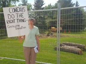 Members of the No Business in the Park group went to Wascana Park to protest the trees being cut down for the construction of the new Conexus Credit Union on June 6, 2018.