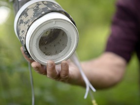 A Centre for Disease Control mosquito light trap, used to attract and trap mosquitoes.