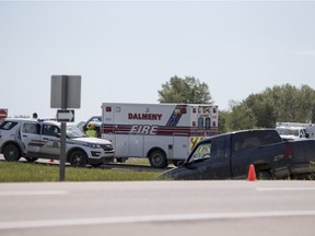 RCMP and Dalmeny Firefighters respond on highway 16 following a two vehicle collision involving a semi-tractor that killed a 55 year woman near Dalmeny, SK on Monday, July 9, 2018.