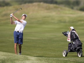 Josh Nagy takes a shot during the provincial junior men's golf championship at Moon Lake Golf and Country Club.