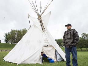 Chris Martell stands in front of his former teepee at the Healing Camp for Justice in Victoria Park in Saskatoon, where it stood from July 10-20.