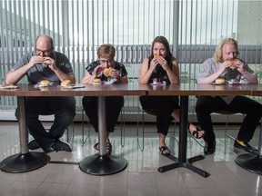 From left, Leader-Post journalists Tim Switzer,  Pamela Cowan, Ashley Martin and Austin Davis try out the Beyond Burger from A&W.