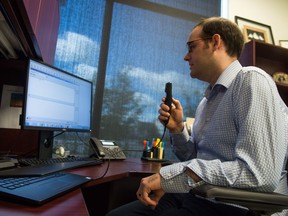 Dr. Mark Bosch demonstrates voice recognition software at the Saskatchewan Cancer Agency on Parliament Avenue.