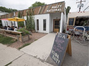 People gather on the patio at Malty National brewery in Regina's Heritage neighbourhood.