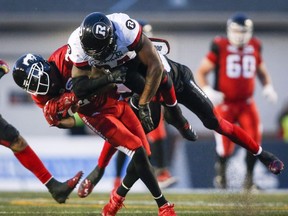 Redblacks linebacker Kyries Hebert was suspended for a game after this head shot on Calgary receiver DaVaris Daniels.