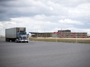 REGINA, SASK :  July 25, 2018  -  A semi tractor trailer unit leaves the Canadian Pacific Intermodal Facility at the  Global Transportation Hub just west of Regina. TROY FLEECE / Regina Leader-Post