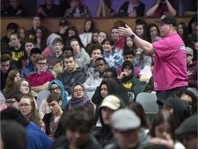 REGINA, SASK :  February 28, 2018  --  Saskatchewan Roughriders Dan Clark speaks to students at Thom Colligate during the Red Cross Pink Day Student Rally, an anti-bullying campaign. TROY FLEECE / Regina Leader-Post