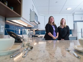 Jacq Brasseur, left, executive director of the UR Pride Centre and Bettina Welsh, University of Regina housing director, stand in a new College West dorm at the university.