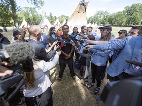 Prescott Demas speaks during an announcement made at the Justice for Our Stolen Children protest camp in Wascana Centre in Regina.