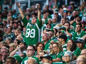 REGINA, SASK : July 5, 2018  -- A Saskatchewan Roughriders fan calls for noise during a game against the Hamilton Tiger-Cats at Mosaic Stadium. BRANDON HARDER/ Regina Leader-Post