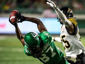 The Saskatchewan Roughriders' Joshua Stanford makes a spectacular, 29-yard reception Thursday to set up the winning touchdown against the Hamilton Tiger-Cats.
