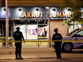 Police work at the scene of a mass casualty incident in Toronto on Sunday, July 22, 2018.