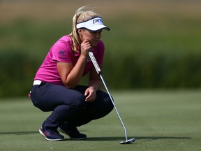 Brooke Henderson of Canada eyes up a putt on the 12th green during the third round of the CP Womens Open at the Wascana Country Club on August 25, 2018 in Regina, Canada.