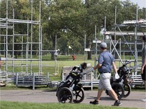 Golfers enjoyed a warm Wednesday at the Wascana Country Club as workers erected scaffolding in advance of the LPGA's CP Women's Open, to be held Aug. 20-26.