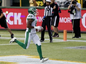 The Saskatchewan Roughriders' Marcus Thigpen scores on a one-yard run during Thursday's CFL game against the Edmonton Eskimos. Saskatchewan ran four other plays from Edmonton's one-yard line and was stuffed each time.