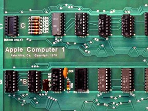 This August 2018 photo provided by RR Auctions shows a close up of the circuit board from a vintage Apple Computer. This Apple-1, which will be auctioned by Boston-based RR Auction in September, is one of about 60 remaining models of the original 200 that were designed and built by Steve Jobs and Steve Wozniak in 1976 and 1977.