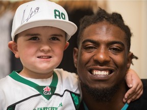Hunter Wessing (left) got to meet former Saskatchewan Roughrider Duron Carter on Tuesday. during a promotional event.