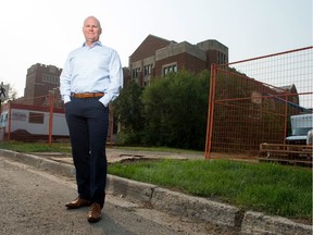 Conexus Credit Union CEO Eric Dillon stands in front of the construction site next to Darke Hall on College Avenue where the new Conexus building is being built.
