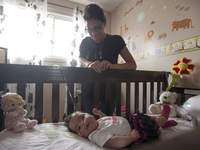 Josie Ledoux is pictured with her granddaughter Aurora in Prince Albert, Sask. on July 12, 2014.