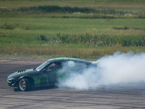 Wayne Karchewski pushes his 1993 Nissan 240SX to the absolute limit during a drifting event being held at Kings Park Speedway. He was forced to pull his car out of the event early, as he blew the car's motor on this run.