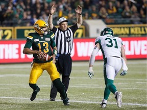 Edmonton Eskimos quarterback Mike Reilly scores the game-winning touchdown against the visiting Saskatchewan Roughriders on Thursday.