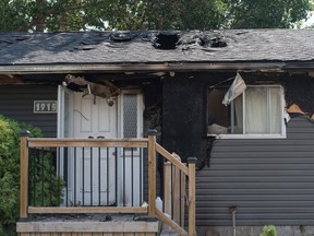 A burned-out home on 12th Avenue North after a fire that started due to a carelessly discarded cigarette butt.