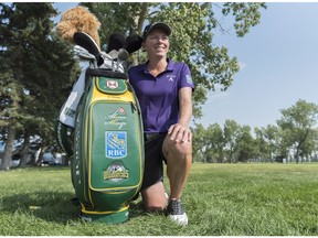 Alena Sharp poses with her golf bag during the CP Women's Open at Wascana Country Club in Regina, Saskatchewan on Tuesday August 21, 2018. Her sponsor, the Royal Bank of Canada, helped make a Humboldt Broncos themed golf bag for the tournament, which will then be donated to the Jim Pattison Children's Hospital Foundation.