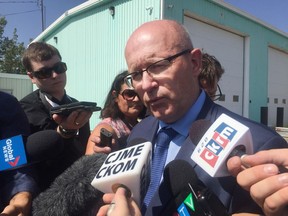 Government Relations Minister Warren Kaeding speaks to reporters during the announcement of an "official investigation" into the situation at the RM of McKillop.