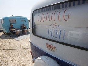 A sign in the window of a trailer from Missouri says it all as David and Sharon McTaggart from Saskatchewan relaxes beside his trailer at the 50th anniversary celebration weekend in Winnipeg. Hundreds of Boler trailers, originally invented and manufactured in Winnipeg, from all corners of North America hit the road and made their way to Winnipeg to celebrate the birth of the iconic camper trailer.