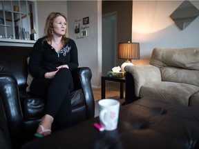 Caroline Little, who spent about seven months homeless, sits in her new home in a building on Empress Street. She was able to move into the apartment with help from Phoenix Residential Society. She's filled out the apartment with items she's found at garage sales. She says having a safe place of her own has had a positive effect on her mental health.