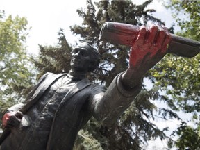 Someone has sprayed red paint on the Sir. John A. Macdonald statue in Victoria Park in Regina. TROY FLEECE / Regina Leader-Post